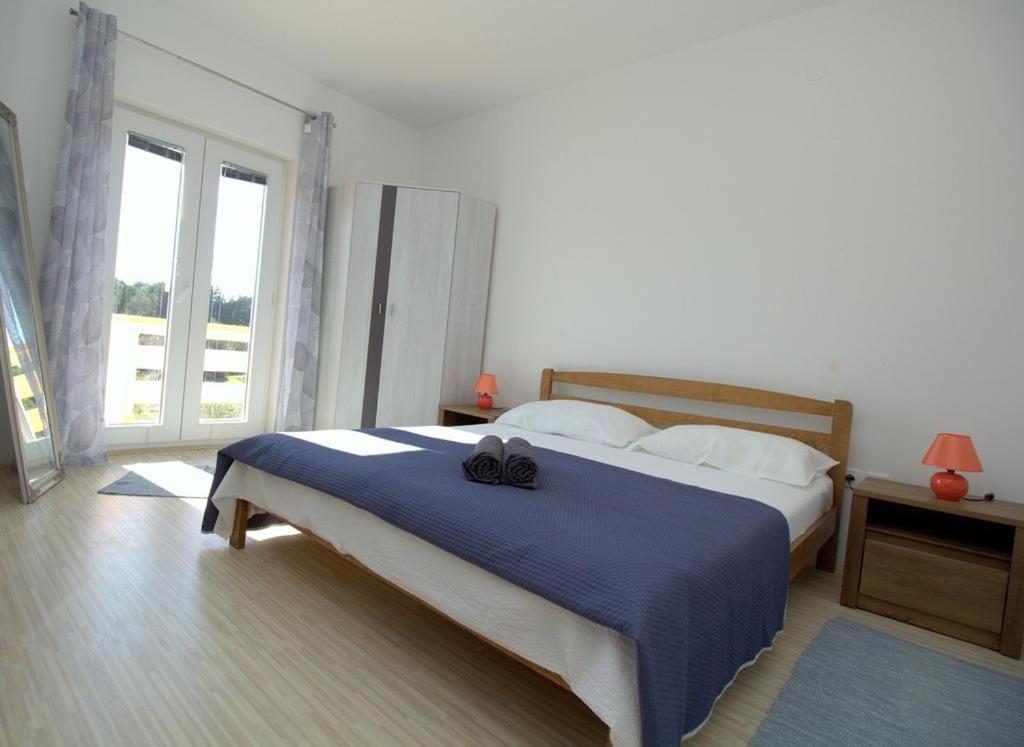 Apartmani Loli Ugljan Bagian luar foto